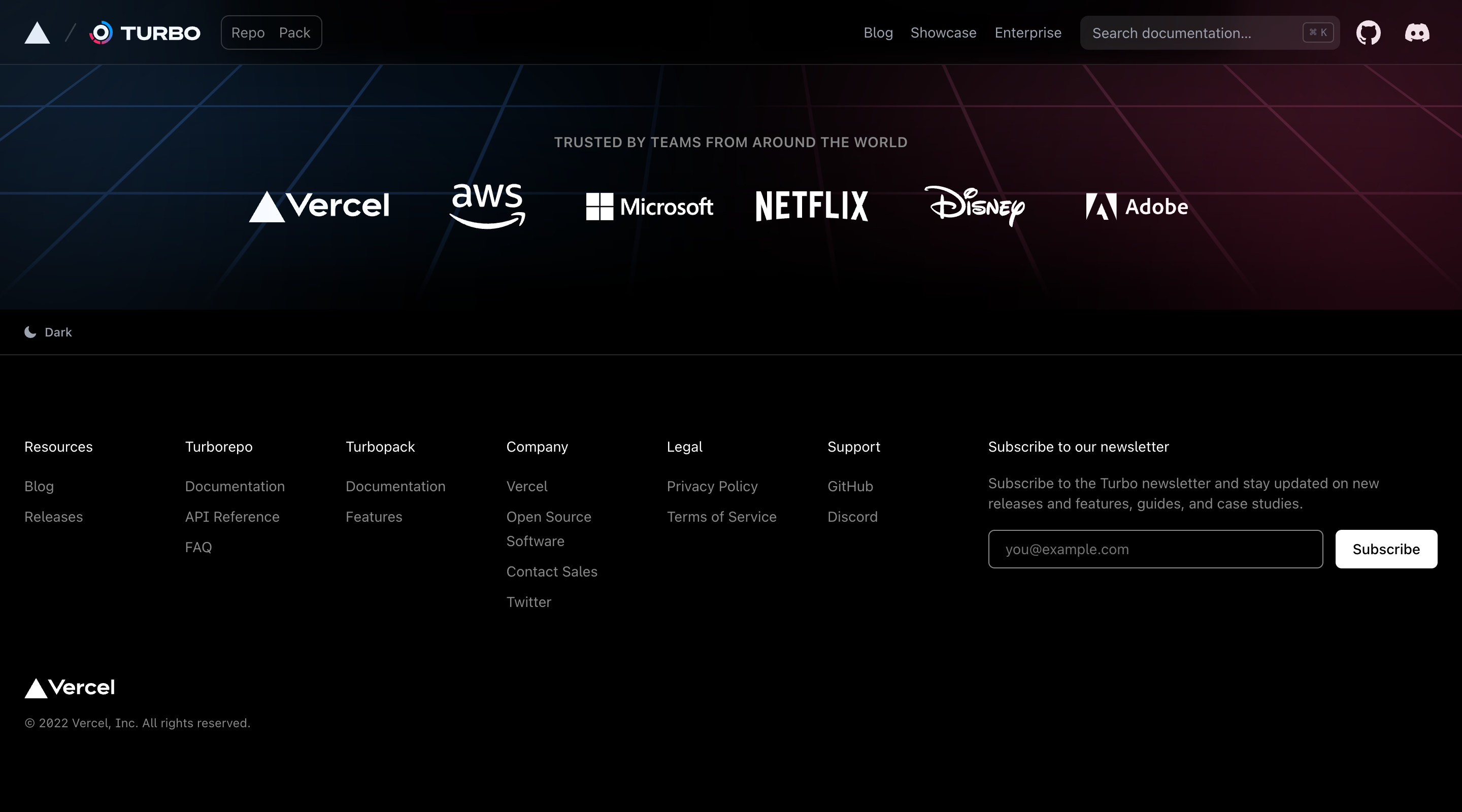 Screenshot of the footer section on the Turbo homepage. The background has a pattern of scares that are titled to give a 3D effect as it feels like the background has perspective. There’s a row of logos from large companies such as AWS and Microsoft. Below is a traditional footer with columns of links to different areas of the site, a Vercel logo and copyright notice, and an email newsletter signup form.