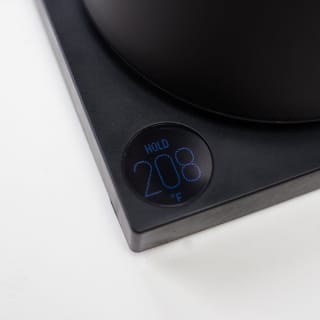 Detail of temperature setting button on kettle bass with digital degree readout.