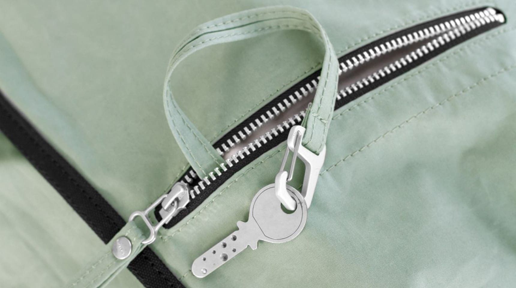 Front zipper pouch with included key ring.